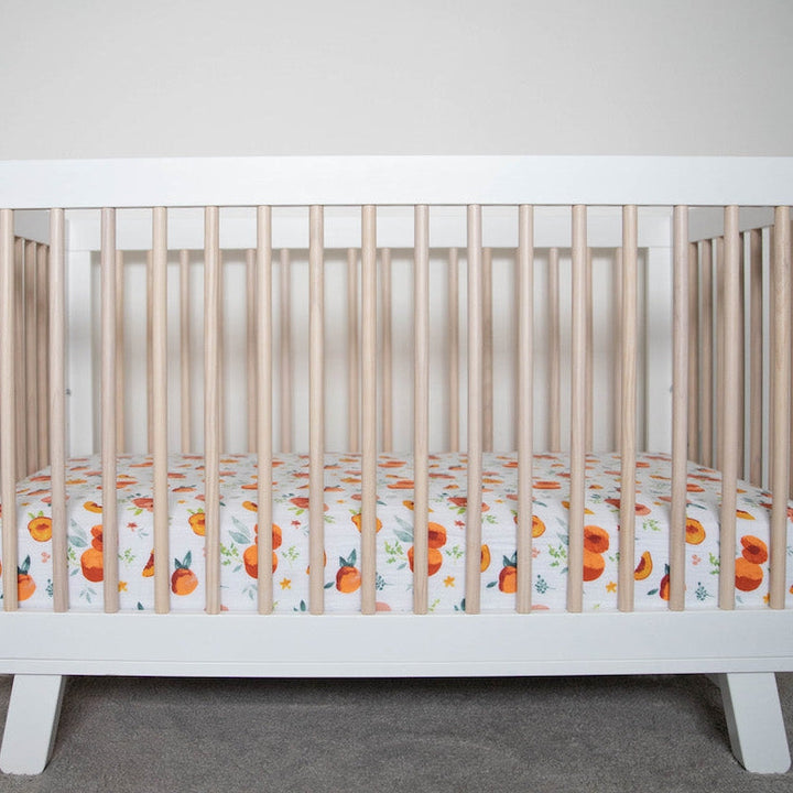 Little Unicorn Cotton Muslin Crib Sheet | Georgia Peach