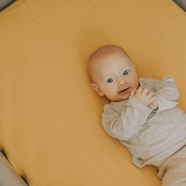 Little Unicorn Cotton Muslin Crib Sheet | Mustard