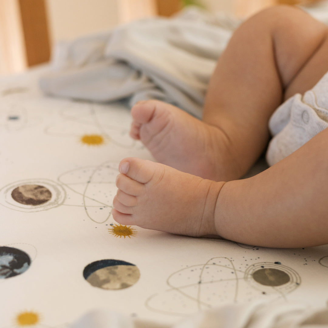 Little Unicorn Stretch Knit Crib Sheet | Planets