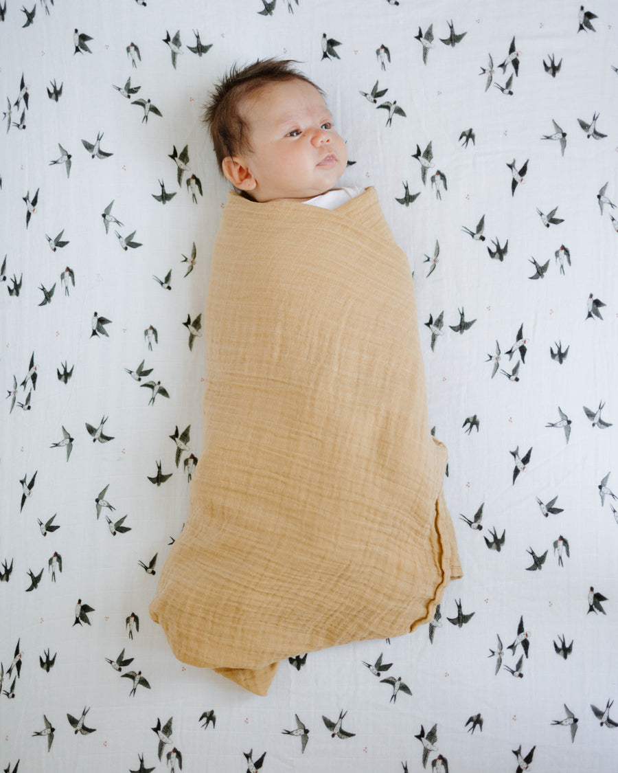 Little Unicorn Organic Cotton Muslin Crib Sheet | Swallows