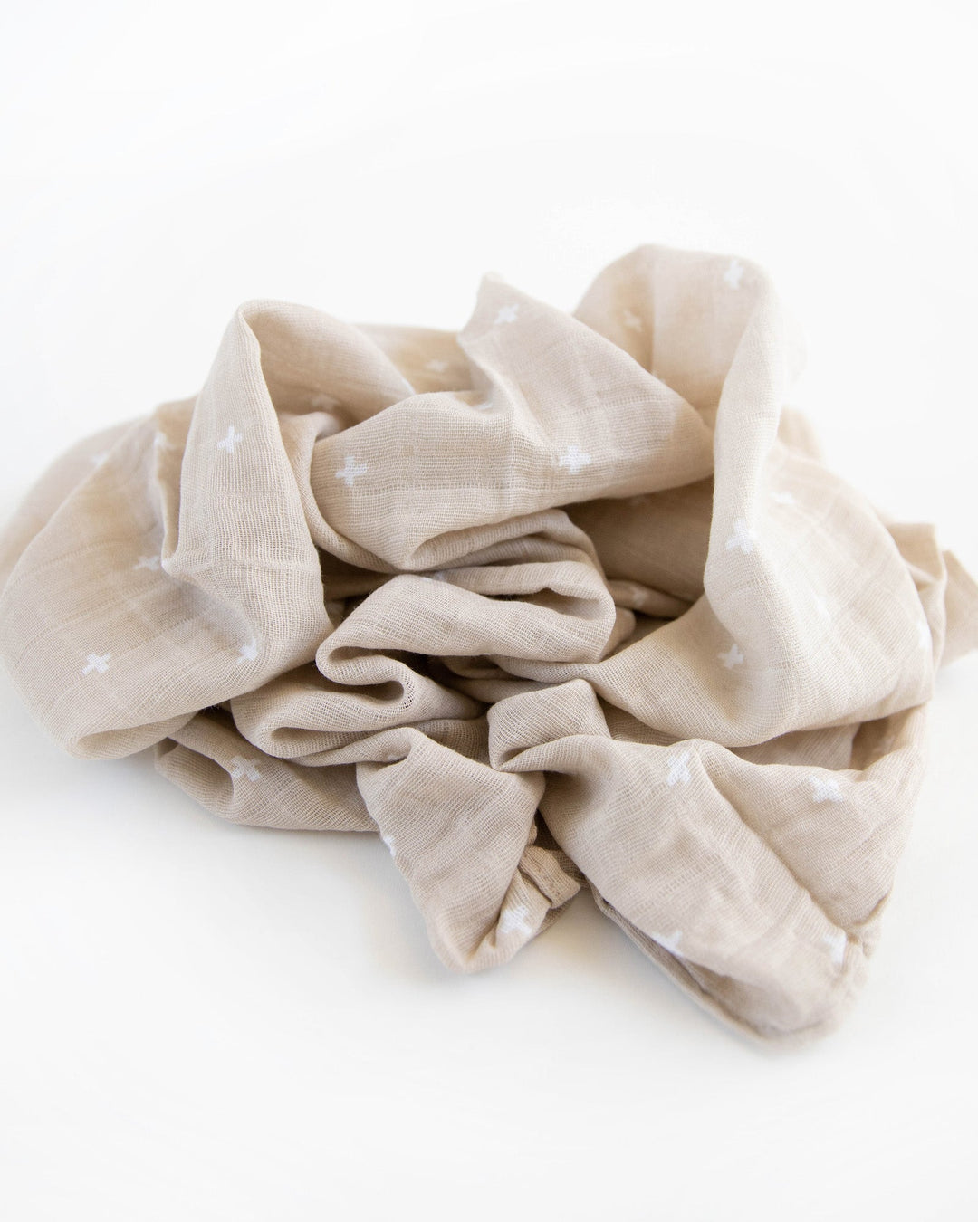 Little Unicorn Cotton Muslin Swaddle Blanket | Taupe Cross