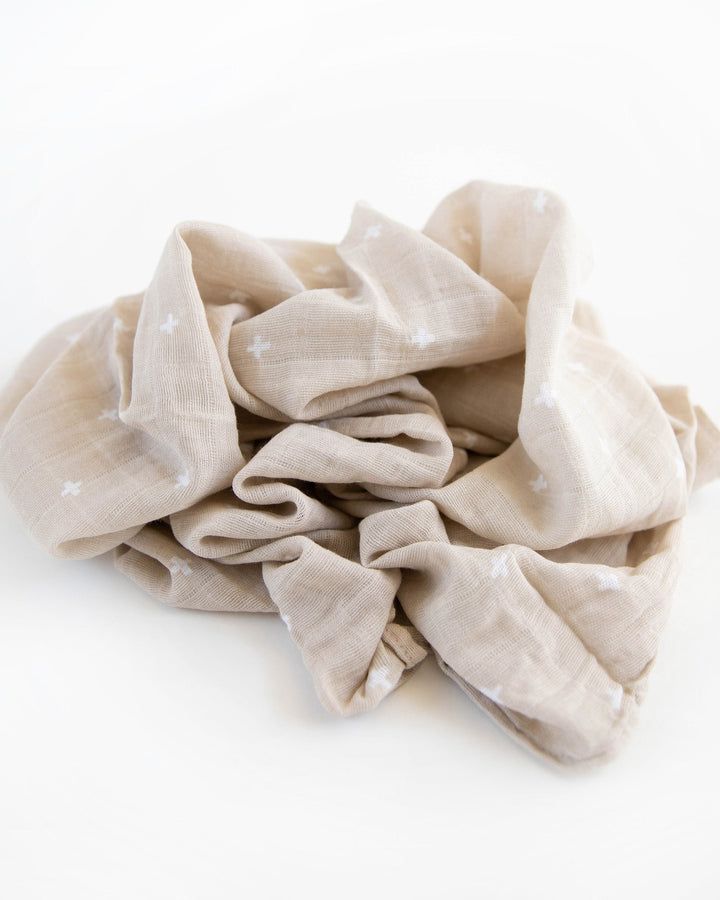 Little Unicorn Cotton Muslin Swaddle Blanket | Taupe Cross