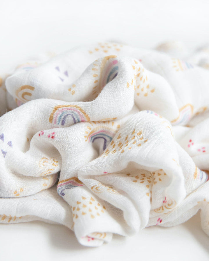 Little Unicorn Deluxe Muslin Swaddle Blanket | Rainbows & Raindrops