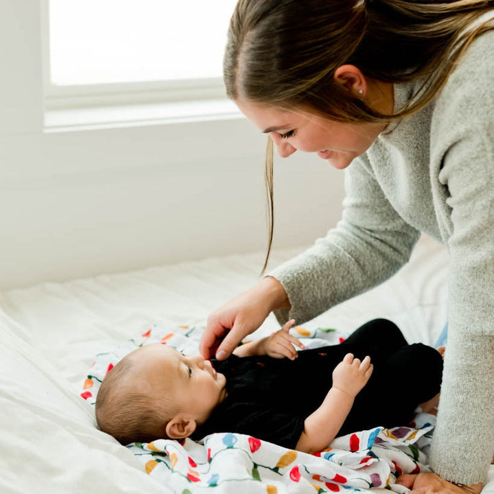 Little Unicorn Cotton Muslin Swaddle Blanket | Christmas Bulbs