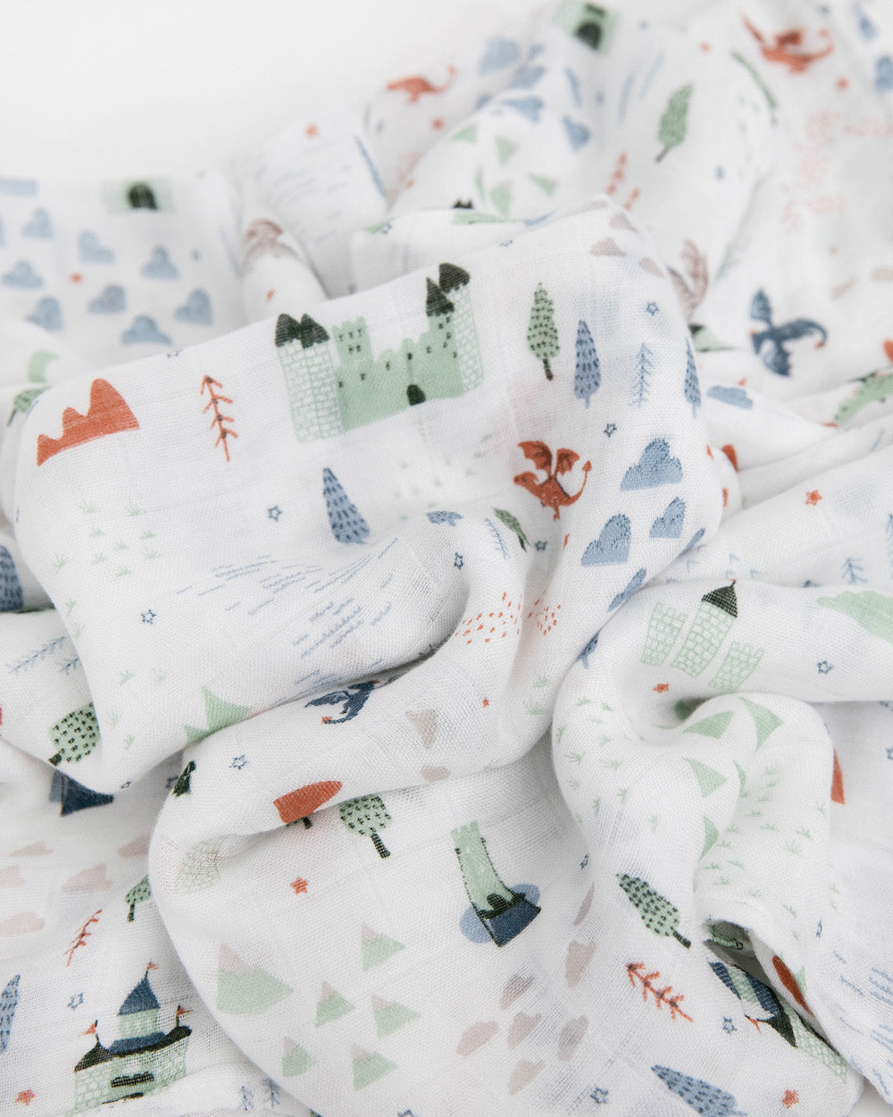 Little Unicorn Deluxe Muslin Swaddle Blanket | Dragon Days