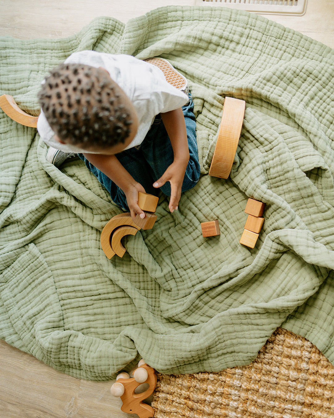 Little Unicorn Cotton Muslin Quilted Throw | Fern