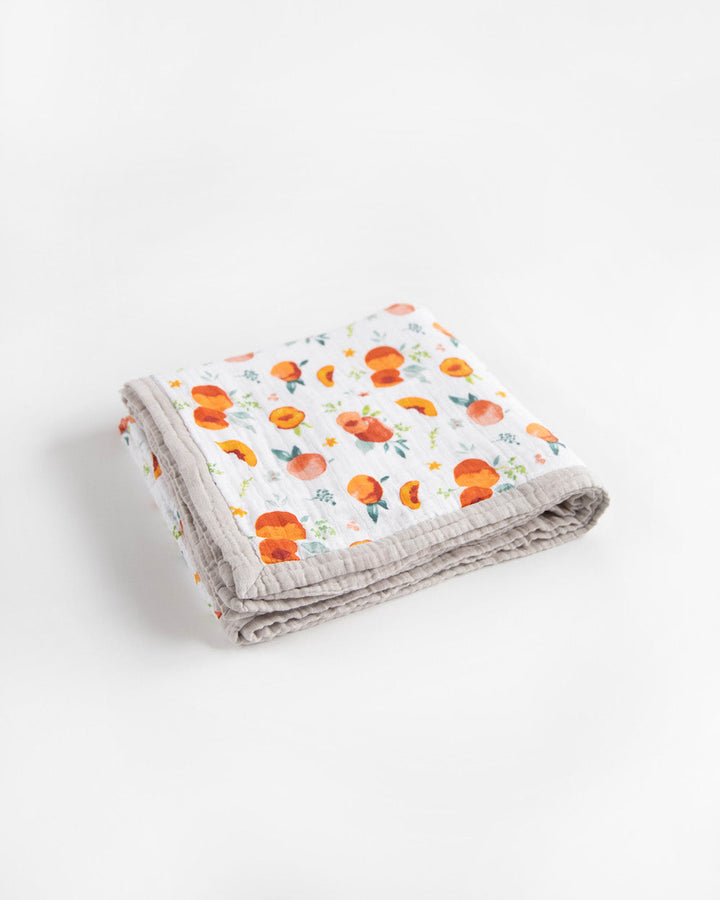 Little Unicorn Cotton Muslin Quilted Throw | Georgia Peach