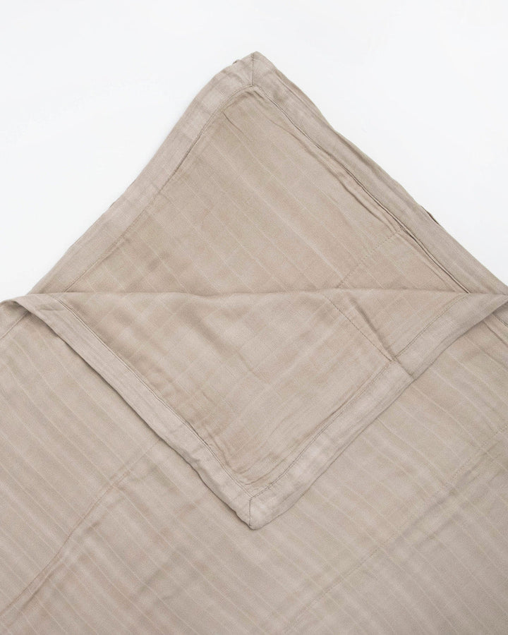 Little Unicorn Deluxe Muslin Quilted Throw | Oatmeal