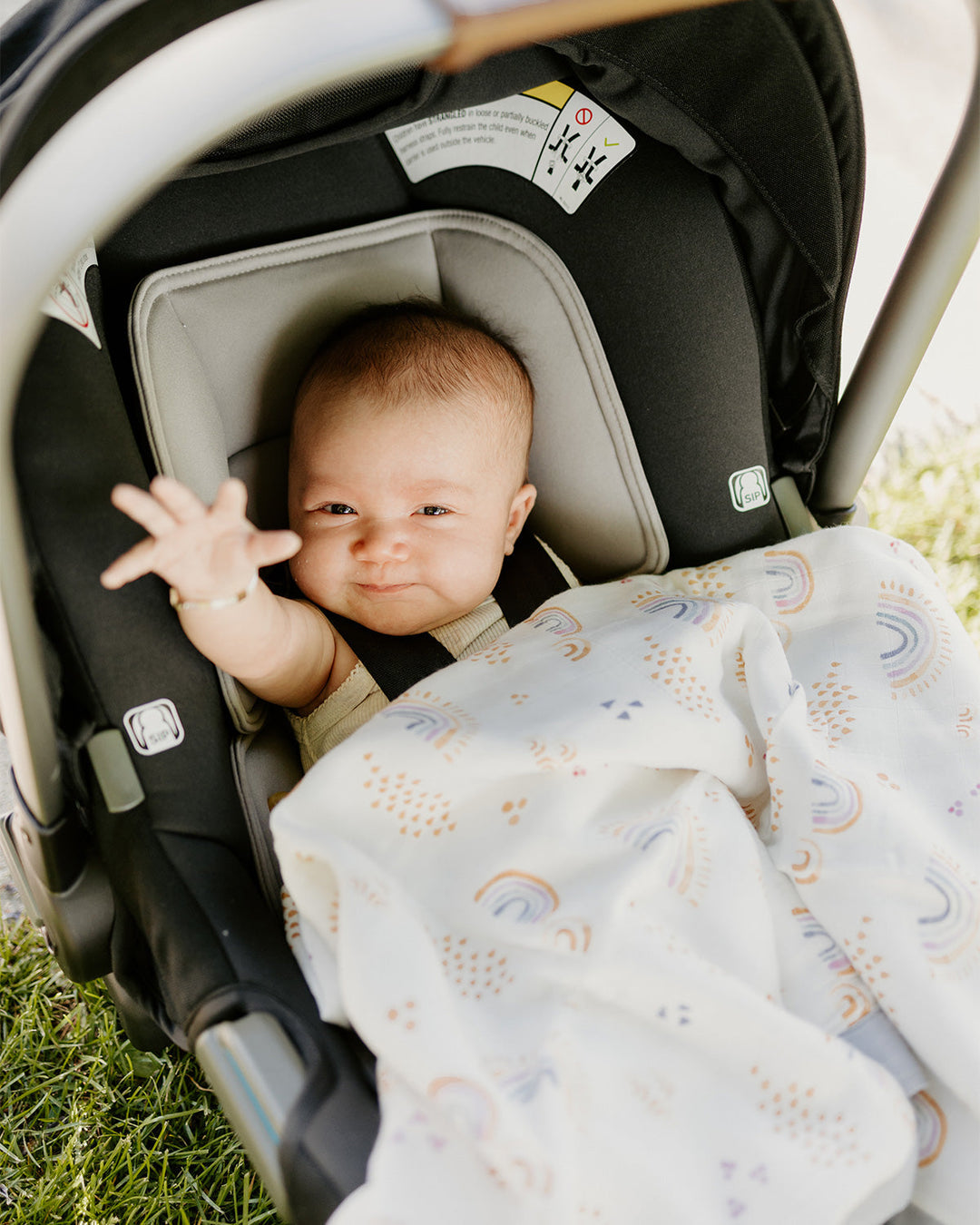 Little Unicorn Deluxe Muslin Baby Quilt | Rainbows & Raindrops