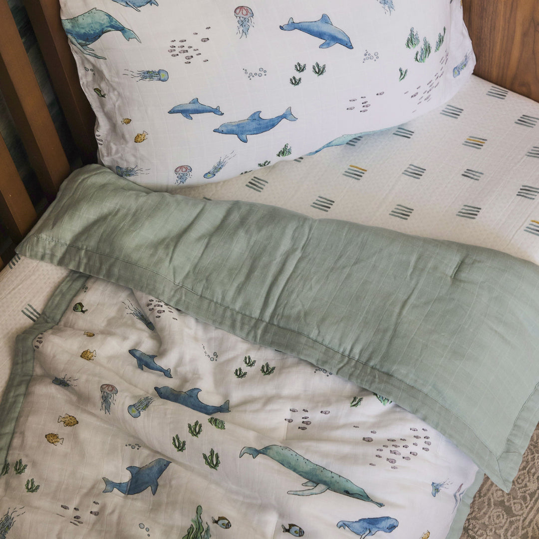 Little Unicorn Cotton Muslin Toddler Comforter | Whales