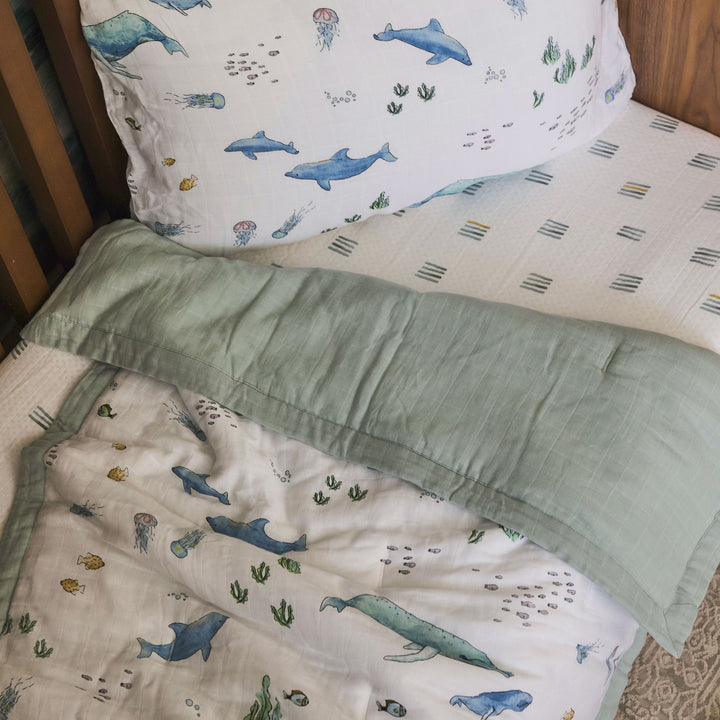 Little Unicorn Cotton Muslin Toddler Comforter | Whales