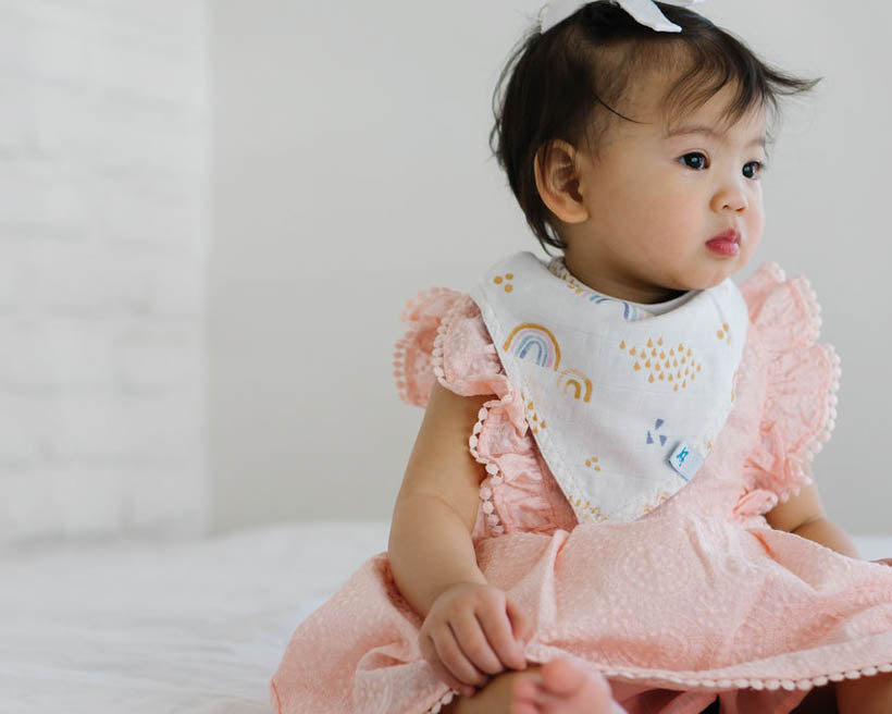 Little Unicorn Deluxe Muslin Reversible Bandana Bib | Rainbows & Raindrops