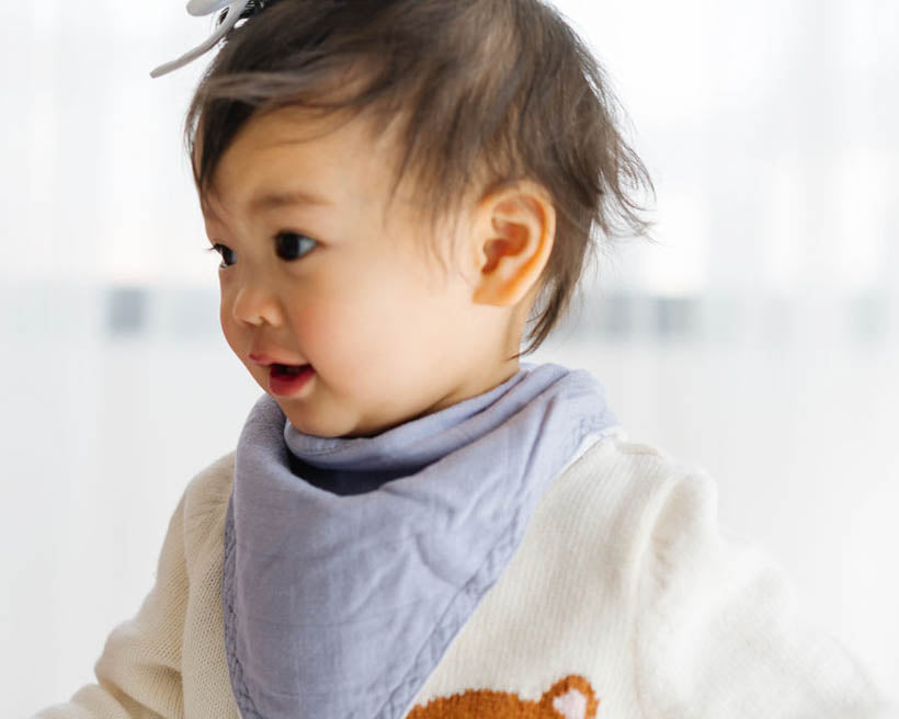 Little Unicorn Deluxe Muslin Reversible Bandana Bib | Rainbows & Raindrops
