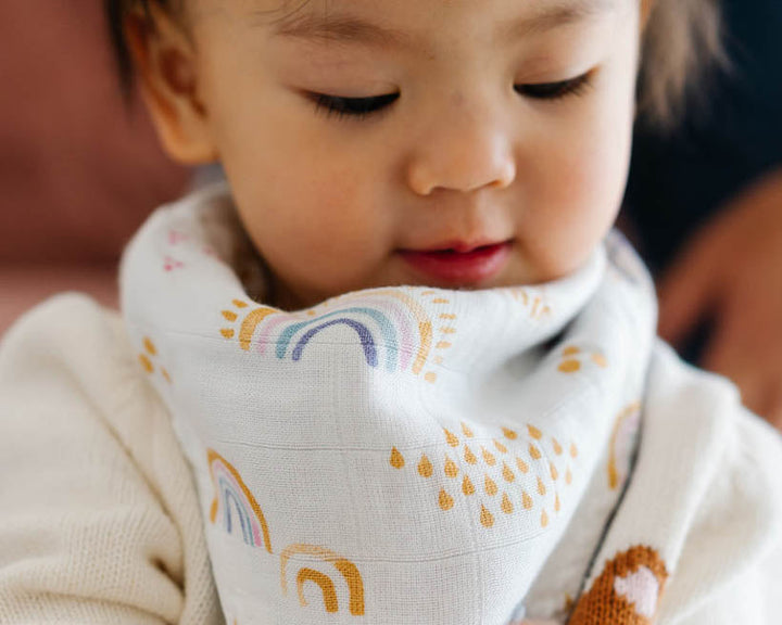 Little Unicorn Deluxe Muslin Reversible Bandana Bib | Rainbows & Raindrops