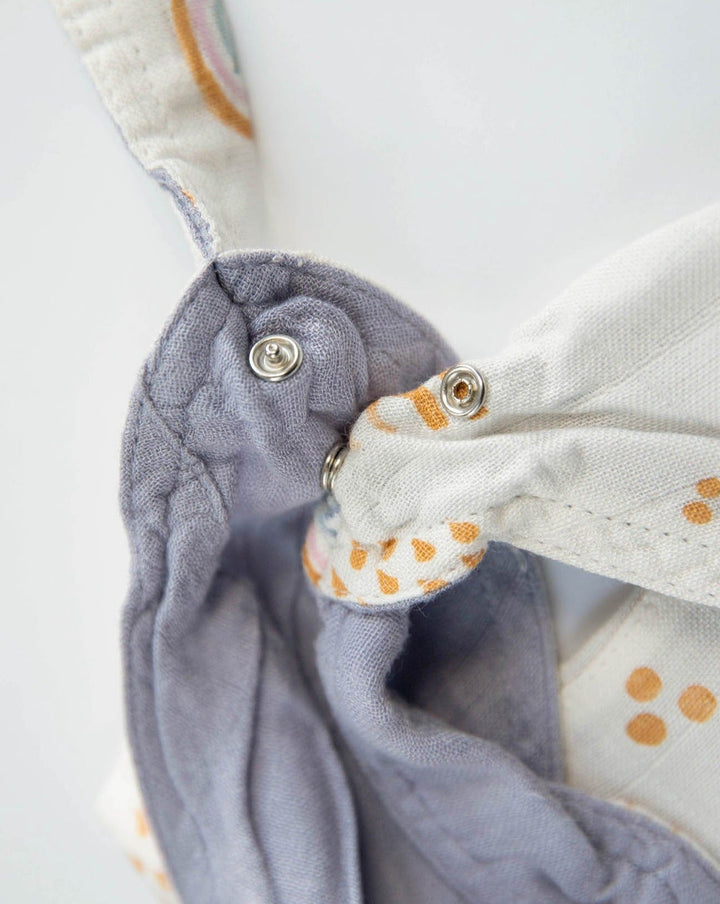 Little Unicorn Deluxe Muslin Reversible Bandana Bib | Rainbows & Raindrops
