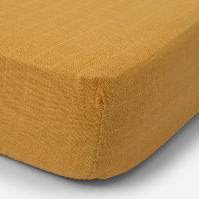 Little Unicorn Cotton Muslin Crib Sheet | Mustard