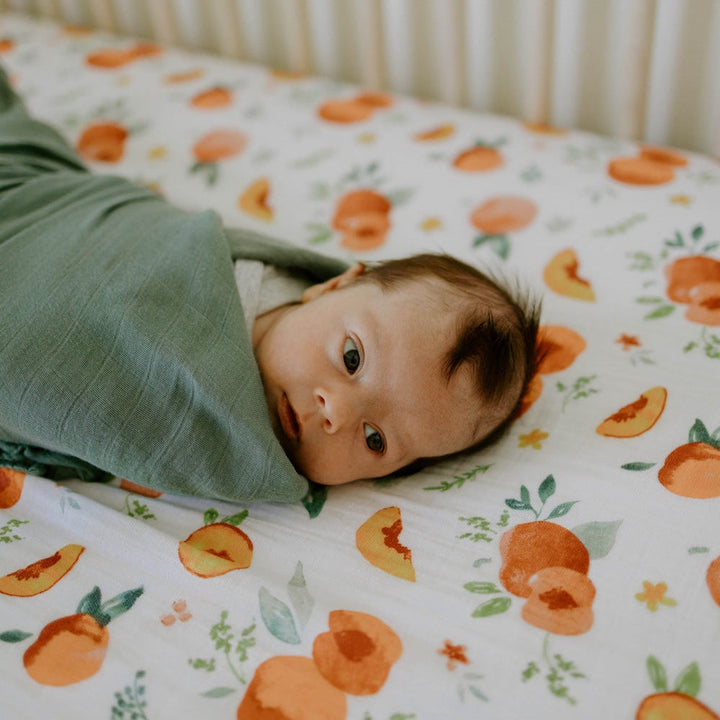 Little Unicorn Cotton Muslin Crib Sheet | Georgia Peach