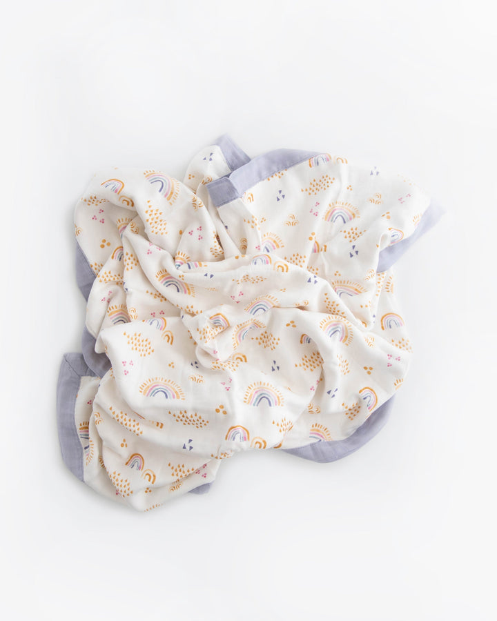 Little Unicorn Deluxe Muslin Baby Quilt | Rainbows & Raindrops
