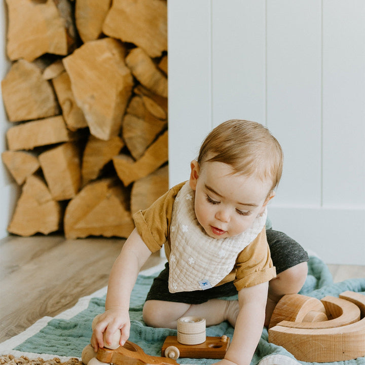 Little Unicorn Cotton Muslin Reversible Bandana Bib | Taupe Cross