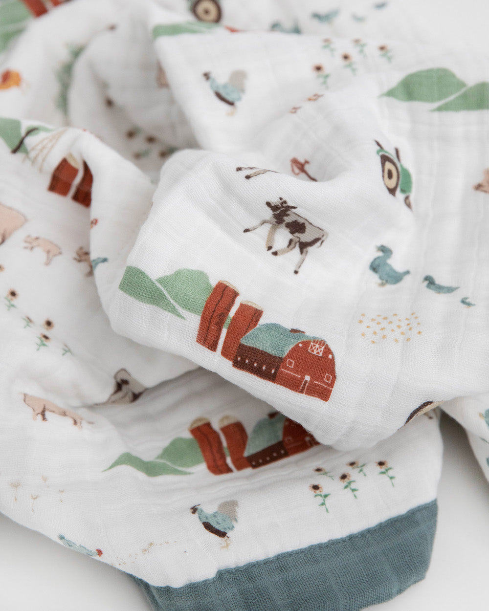 Little Unicorn Cotton Muslin Baby Quilt | Farmyard