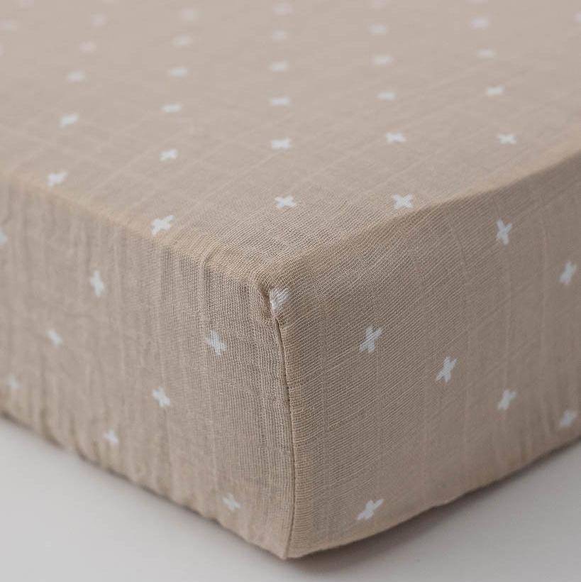 Little unicorn taupe top cross crib sheet