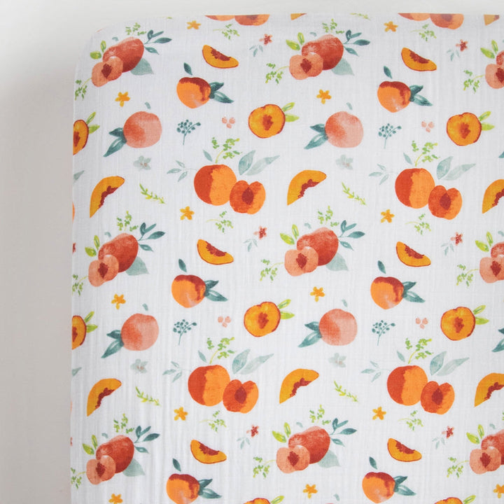 Little Unicorn Cotton Muslin Crib Sheet | Georgia Peach